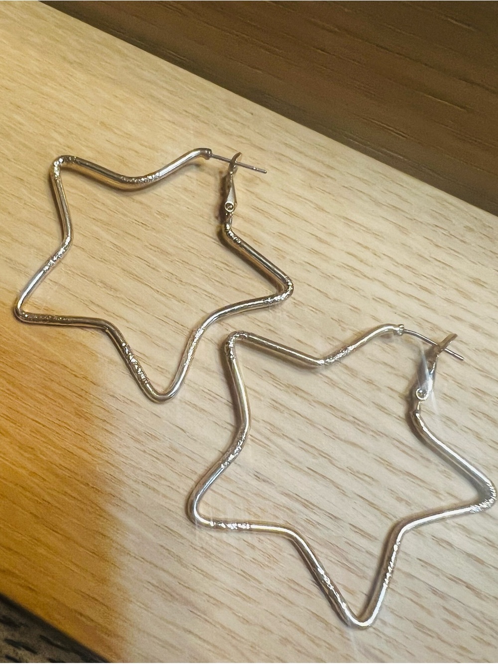 Star-Shaped Hoop Earrings in Gold Tone